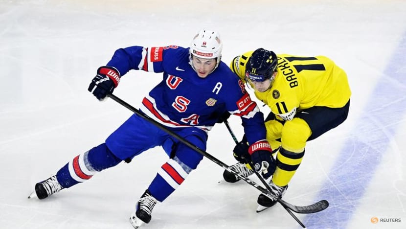 Ice hockey-McCarron stakes claim for world championship gold as US down Sweden