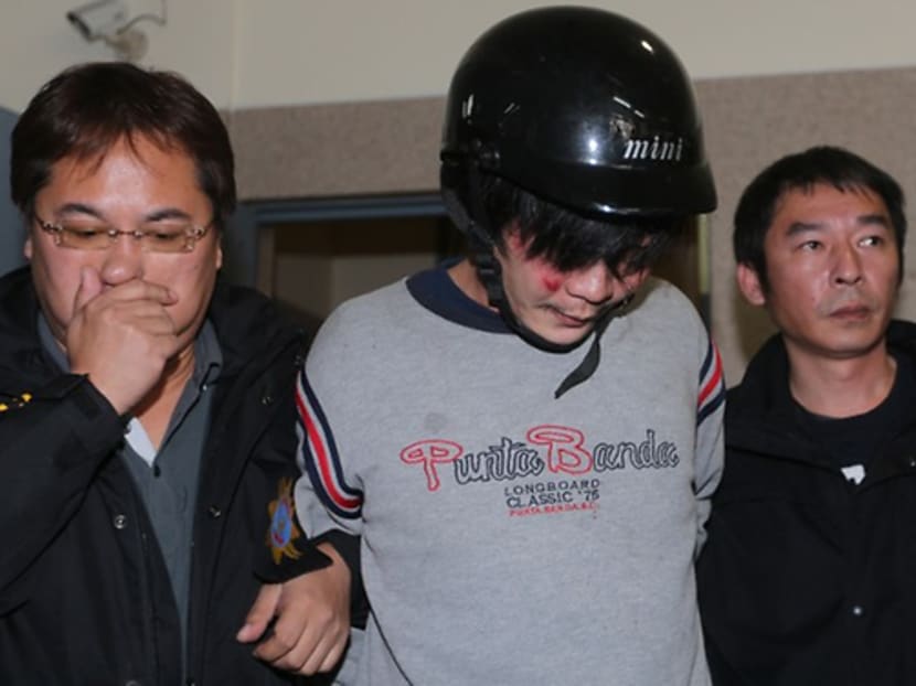 Wang Ching-yu during his arrest in March 2016. AFP file photo