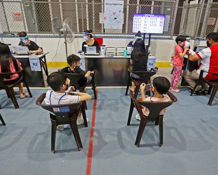 Covid-19: MOE to bus primary school students to paediatric vaccination centres after March 2022 holidays 