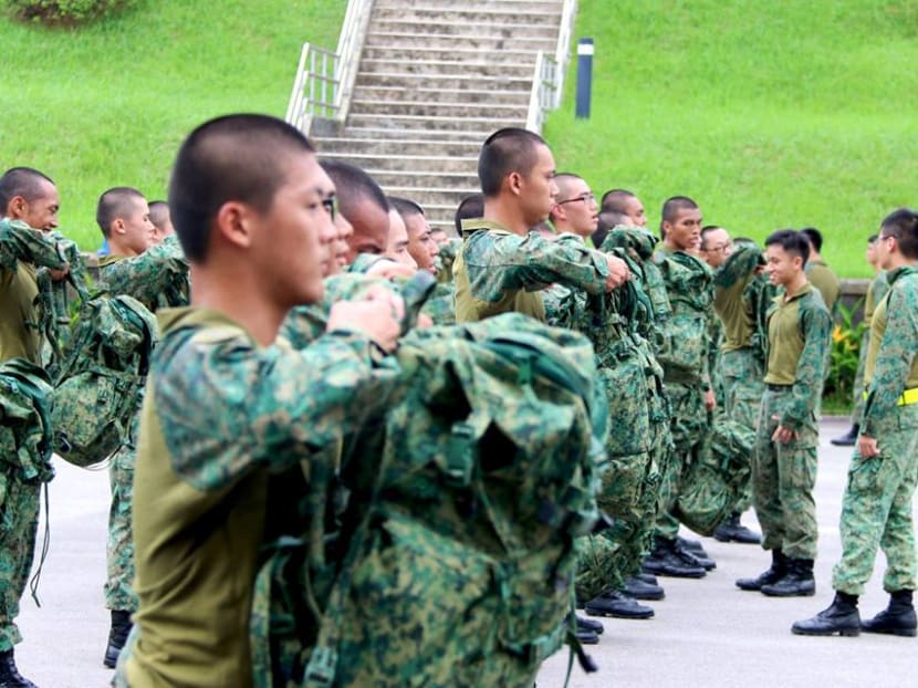 Singapore Armed Forces personnel carrying out a combat physical training exercise in their hybrid uniform. Singapore Armed Forces personnel carrying out a combat physical training exercise in their hybrid uniform.