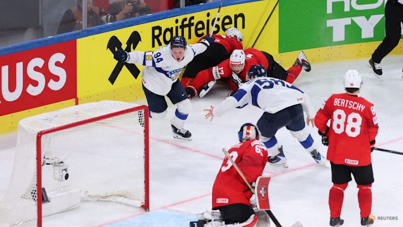 Ice hockey-Helenius is the hero as Finland beat Swiss in world final