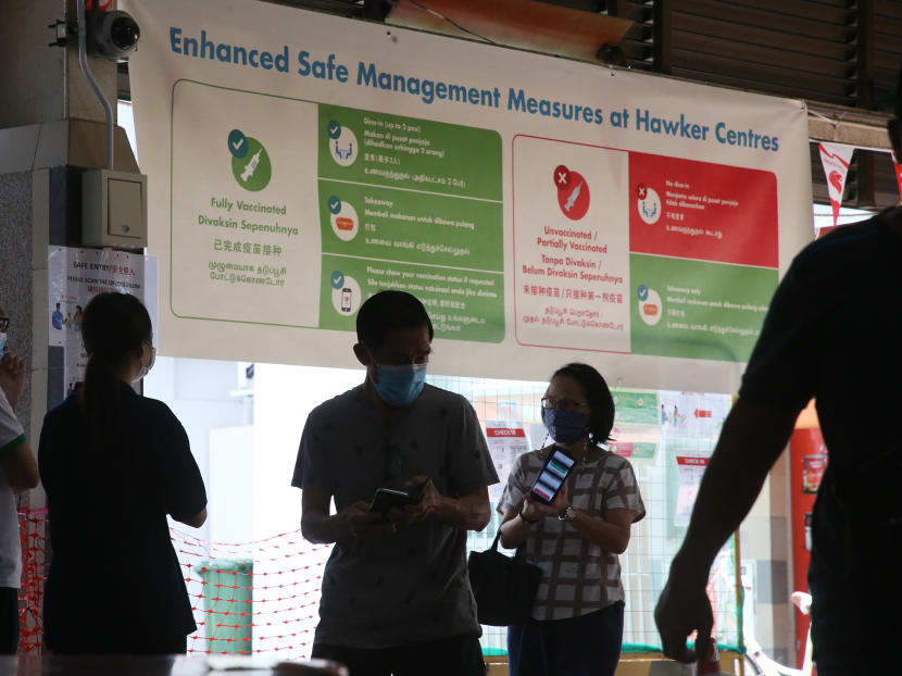 At hawker centres, fully vaccinated or eligible persons will be given a sticker to identify them so that they will be allowed to eat there, while those who are not vaccinated or partially vaccinated can only buy food to take away. At hawker centres, fully vaccinated or eligible persons will be given a sticker to identify them so that they will be allowed to eat there, while those who are not vaccinated or partially vaccinated can only buy food to take away.