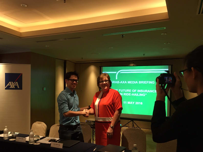 Under the Pay-As-You-Grab policy, drivers pay a flat rate of 70% of the commercial auto insurance base premium, followed by S$0.06 for each subsequent kilometre they cover, capped at 100% of the base premium. Photo: Siau Ming En