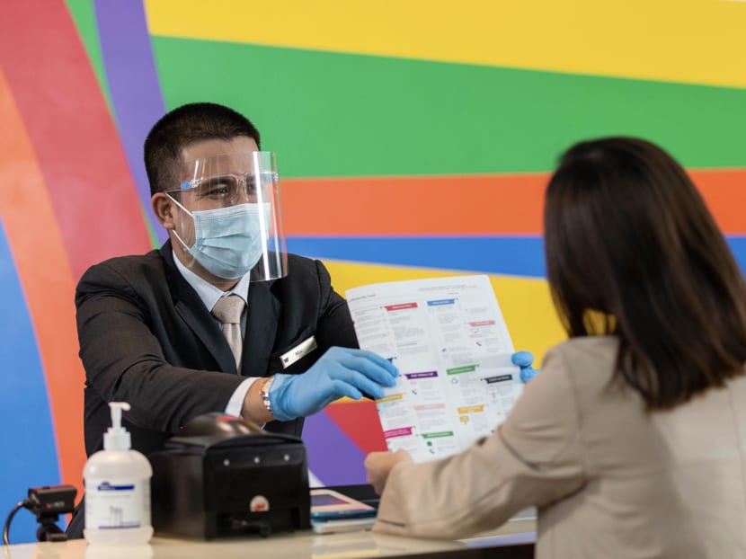 A hotel employee greeting a guest at Marina Bay Sands. The resort is among a number of hotels in Singapore still looking to fill some job vacancies. A hotel employee greeting a guest at Marina Bay Sands. The resort is among a number of hotels in Singapore still looking to fill some job vacancies.