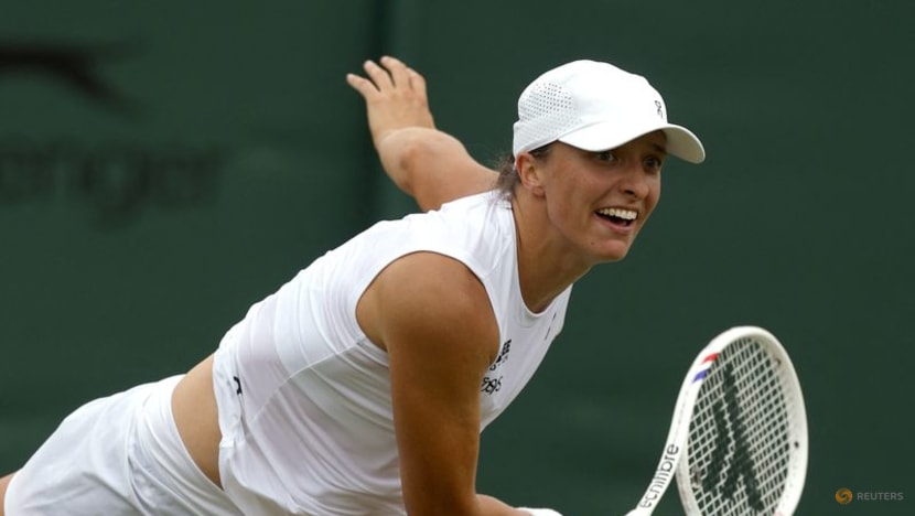 Feeling hot, hot, hot - Swiatek downs Wimbledon debutant to reach round two Feeling hot, hot, hot - Swiatek downs Wimbledon debutant to reach round two