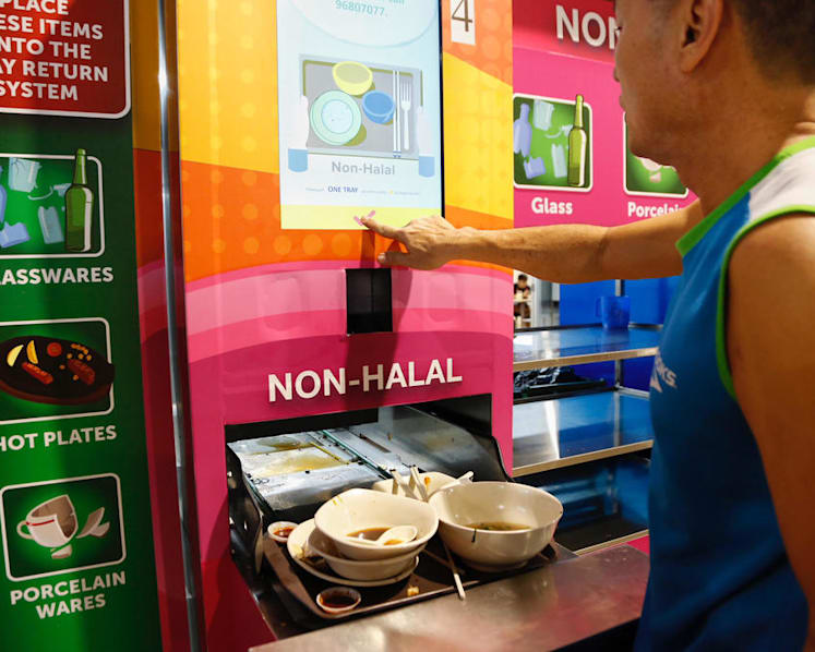 Stop cleaners from clearing tables at hawker centres that charge deposits for trays