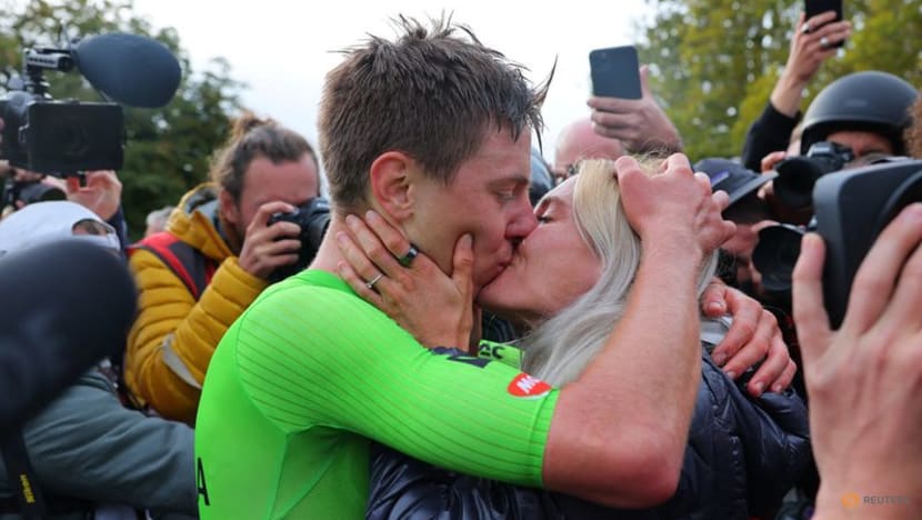 Leader Pogacar keeps ear on partner's progress in middle of Tour stage