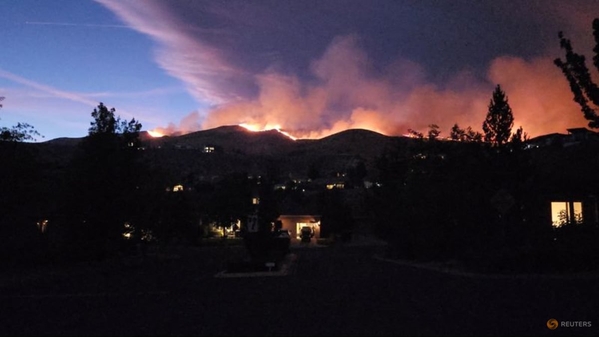 Tens of thousands evacuated as fire bears down on US city