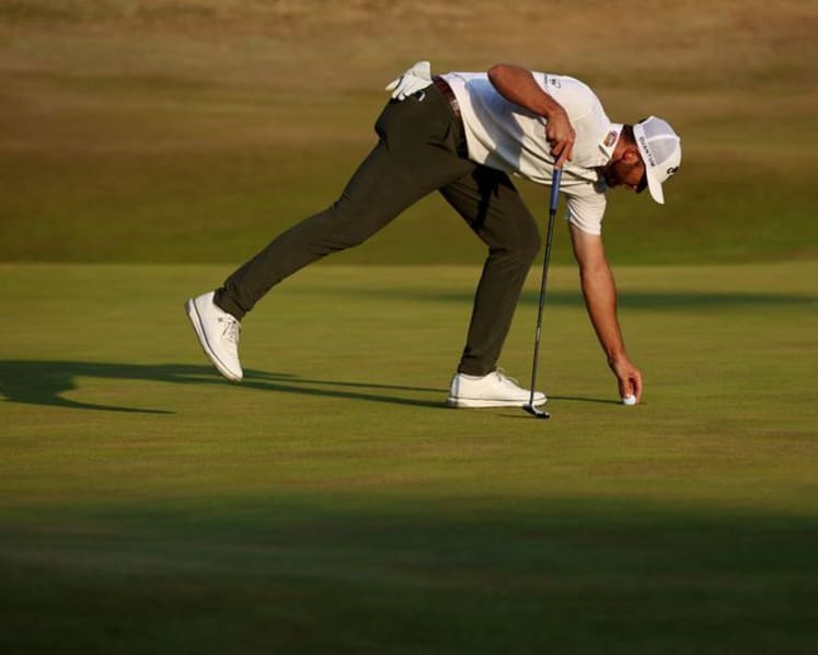 Burns seizes Open lead, DeChambeau shrugs off penalty to stay in the mix