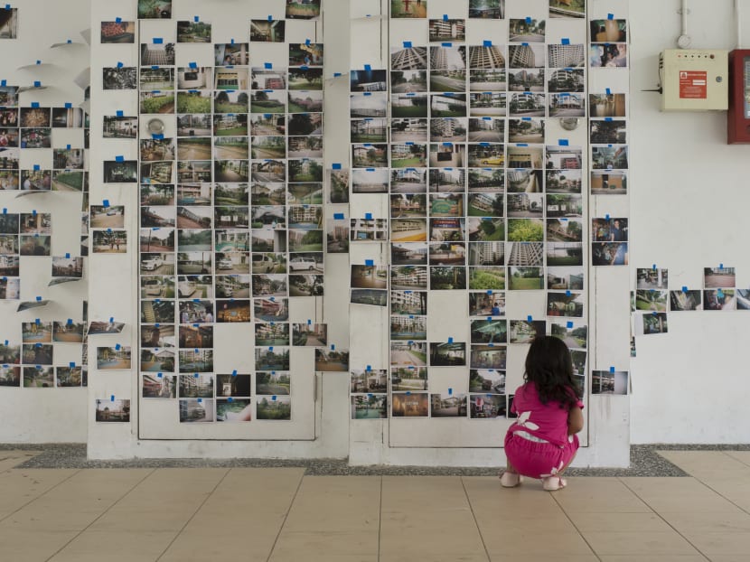 Photos taken by youths who participated in the Hello Heartlands! project were left on a wall at the void deck of Block 269A Yishun St 22 after the conclusion of the exhibition on June 24, 2017. Photo: Hello Heartlands! Photos taken by youths who participated in the Hello Heartlands! project were left on a wall at the void deck of Block 269A Yishun St 22 after the conclusion of the exhibition on June 24, 2017. Photo: Hello Heartlands!