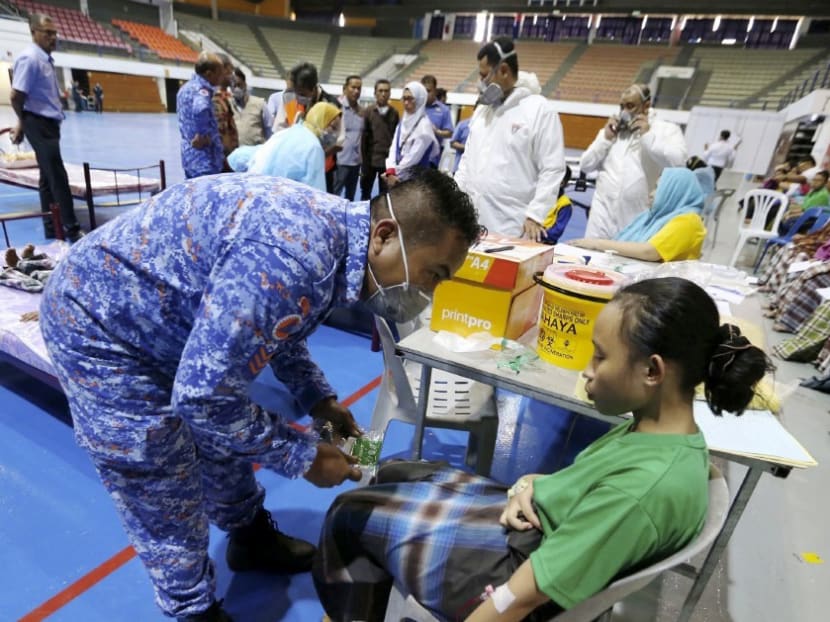 A student receives treatment after the latest pollution incident at Pasir Gudang earlier this month.