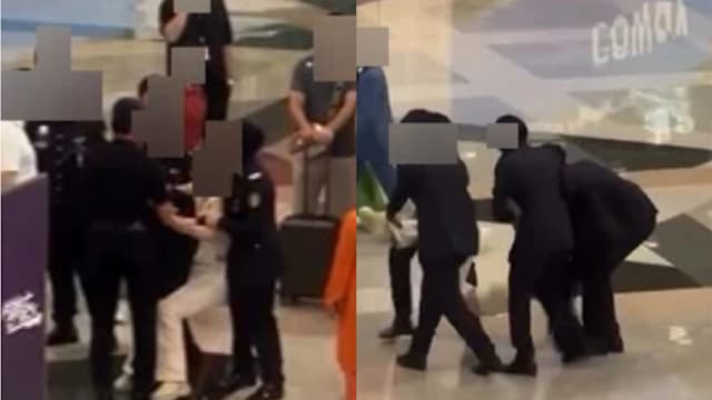 没钱买机票擅闯离境厅 中国女子情绪失控四警联手抬走