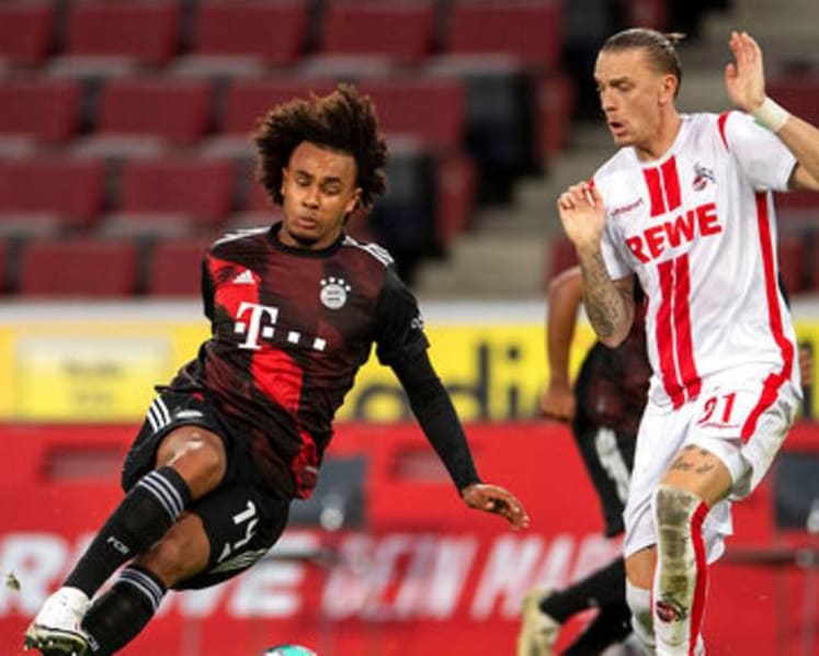 Football: Bayern labors under busy schedule but goes top in Bundesliga