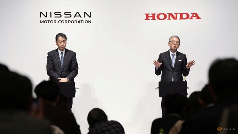 Honda, Nissan in talks to set up holding company, source says Honda, Nissan in talks to set up holding company, source says