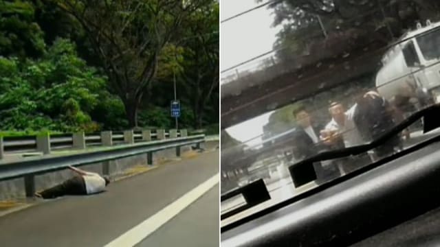 阿叔受伤躺快速公路上 两好心司机停车帮忙