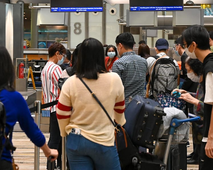 As Covid-19 cases surge abroad, Singaporean travellers make adjustments to their trips, take extra precautions