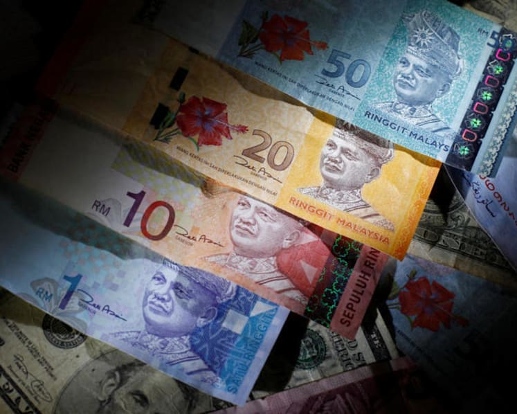 Singdollar loses ground against ringgit after hitting 17-month high