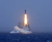 Commentary: Was China’s submarine missile test a routine or warning shot?