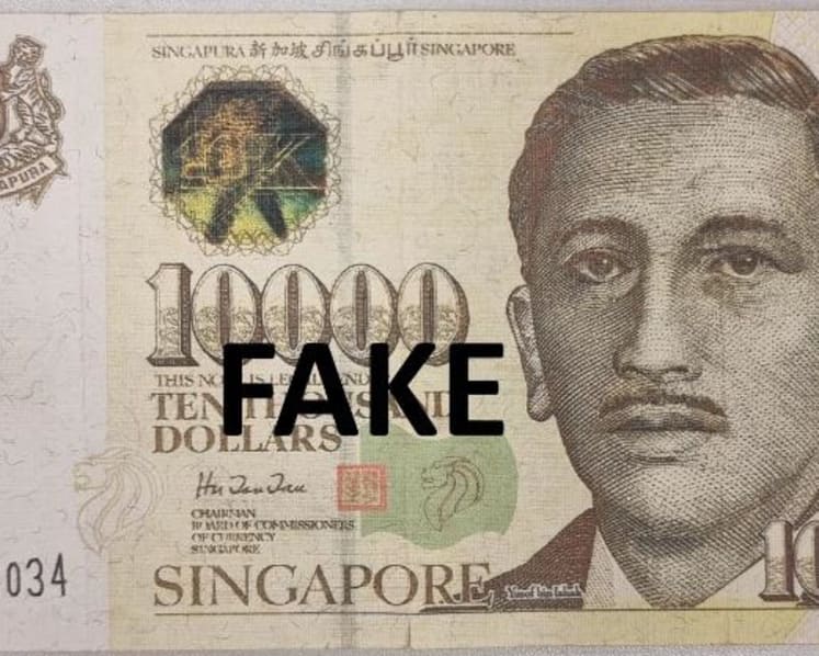 Man and 2 women arrested for using fake S$10,000 note 