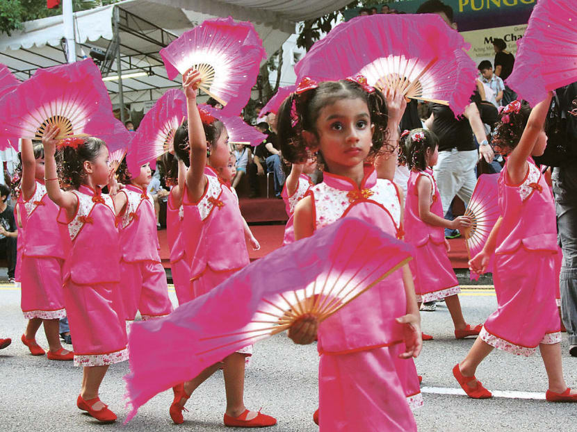 Performers at a racial harmony street parade in Punggol North. There is no such thing as a single Singaporean culture, and it gets better when more cultures are added. TODAY FILE PHOTO