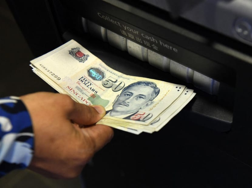 Thae Thae Mar, 34, made unauthorised cash withdrawals amounting to S$28,760 using her employer's ATM card.