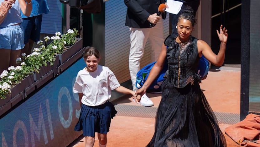 Osaka embracing role as entertainer after another grand walk-on