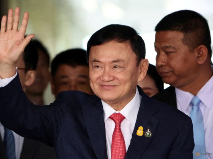 Former Thai Prime Minister Thaksin Shinawatra waves at Don Mueang airport in Bangkok, Thailand on Aug 22, 2023.