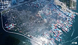 Fire razes 1,000 'stilt' homes in Malaysia's Sabah, thousands displaced 