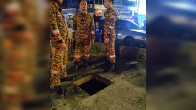 疑下车找父亲 马国男童跌入下水道身亡