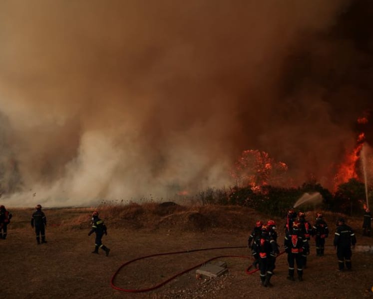 Wildfire flares up again in Greece as water bombers deployed
