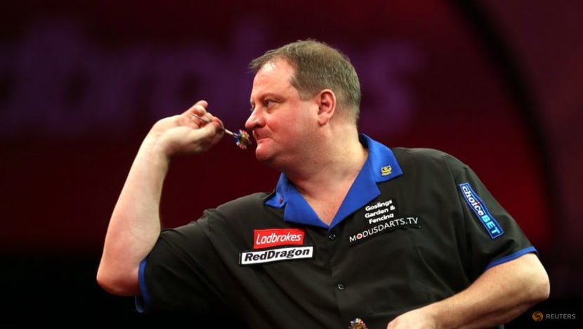 Darts-Jenkins given 11-year ban over match fixing charges