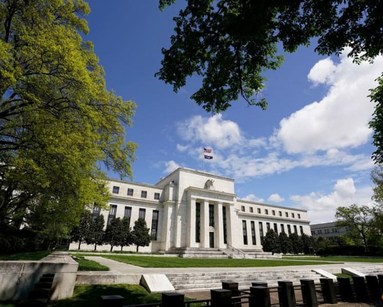 Dollar firms near one-month highs ahead of Fed decision