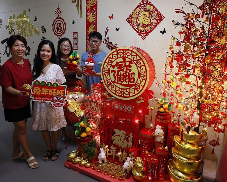 'Reliving the kampung spirit': Neighbours put up CNY decorations together outside HDB homes; non-Chinese join in the festivities