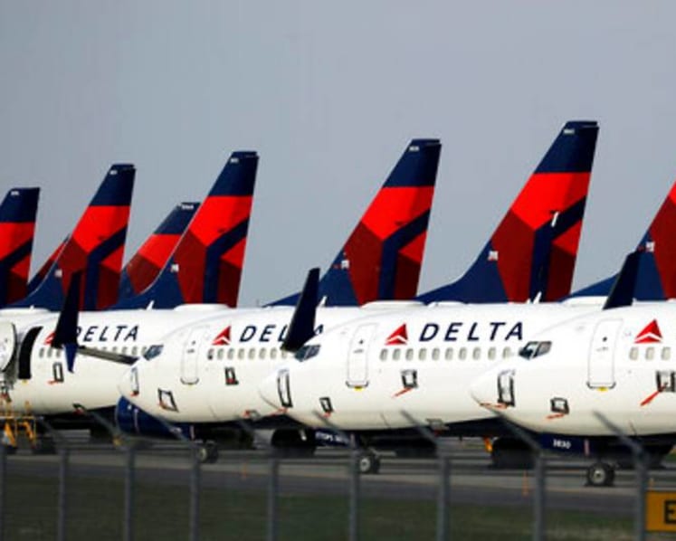 Delta asks more workers to take leave as travel slump widens