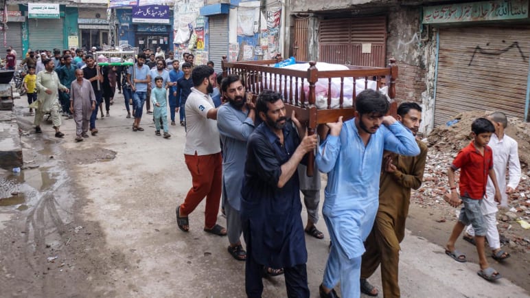 Pakistan flash floods and heavy rains kill 24