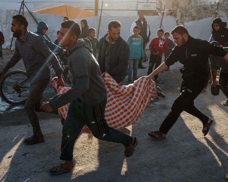 Israeli strike kills two Palestinians in a car in Gaza, medics say