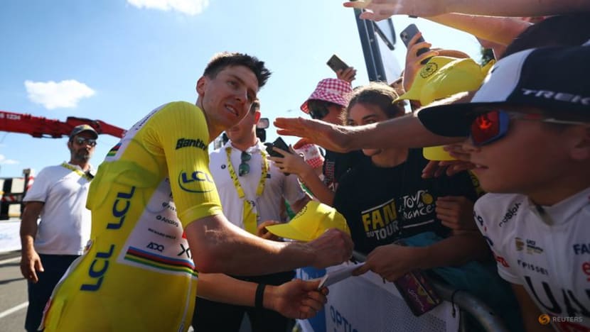 Leader Pogacar keeps ear on partner's progress in middle of Tour stage