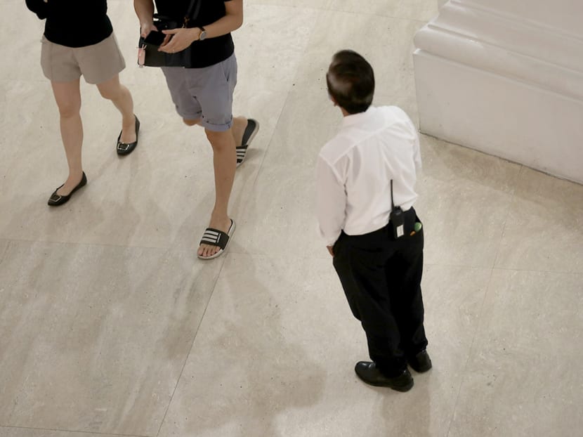 The Ministry of Manpower said that it was committed to safeguarding the welfare of all workers, including security officers, and urged anyone who knows of violations of employment law to report them to the ministry.