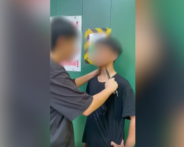 Two teenagers charged over threatening boy with a knife