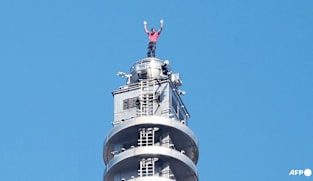 American rock climber Alex Honnold completes rope-free ascent of Taipei 101