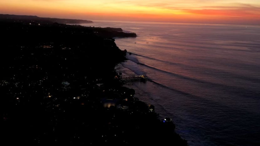 Power begins to return after outage in Indonesia's Bali island  