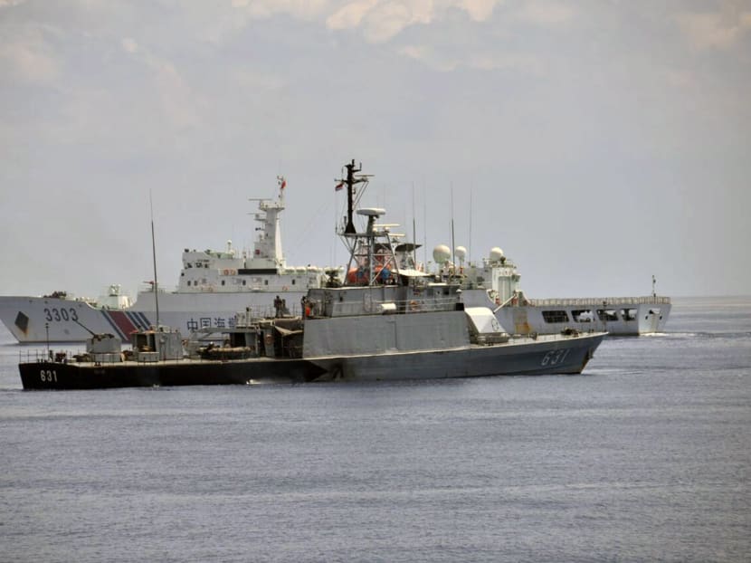 Indonesian navy vessel KRI Todak (F) is seen next to a Chinese Coast Guard vessel (B) while it was trying to detain the fishing boat Han Tan Cou in the waters near Natuna Islands, Riau Islands province, Indonesia, June 17, 2016 in this Indonesian Navy handout photo provided by Antara Foto. Indonesian navy vessel KRI Todak (F) is seen next to a Chinese Coast Guard vessel (B) while it was trying to detain the fishing boat Han Tan Cou in the waters near Natuna Islands, Riau Islands province, Indonesia, June 17, 2016 in this Indonesian Navy handout photo provided by Antara Foto.