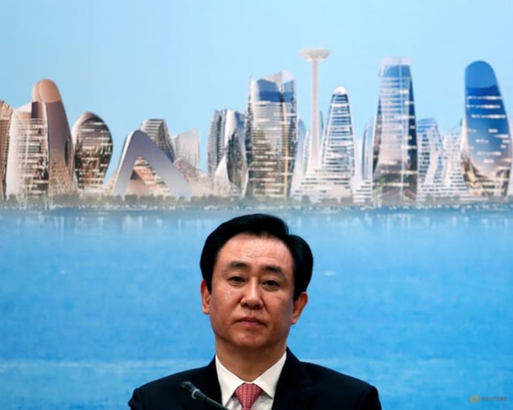 China jails Evergrande founder for life, fines firm more than US$2 billion