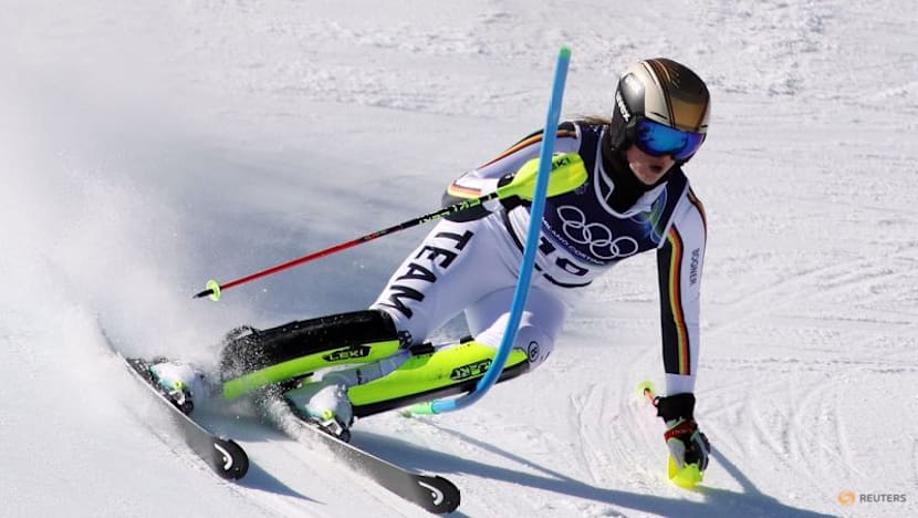 Alpine skiing-Suter wins Soldeu downhill, Aicher closes gap to absent Vonn