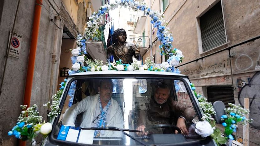 Maradona statue rides through Naples as city remembers Argentine great