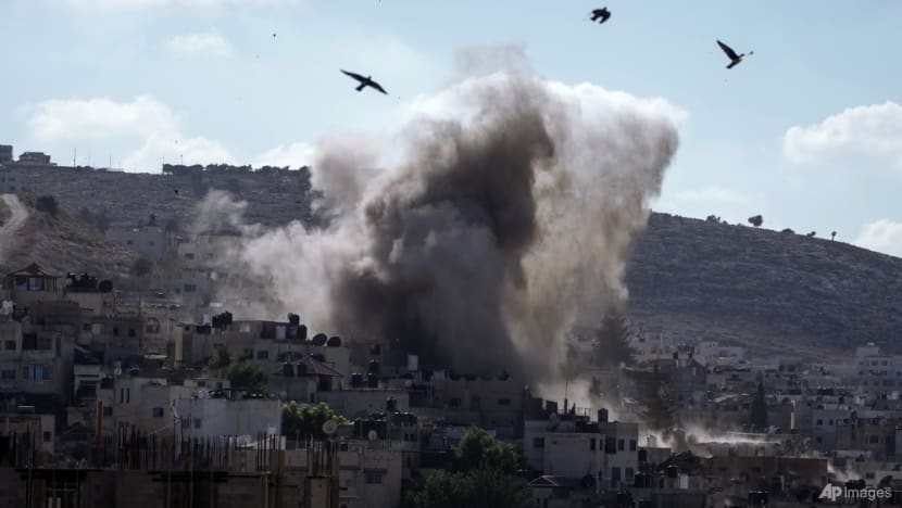 Israeli drone strike kills Palestinian gunmen amid more West Bank raids