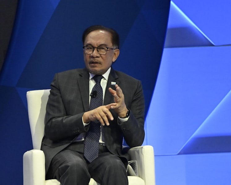 Analysis: Malaysia PM Anwar’s rating dips after first year, but his focus must stay on longer-term reforms