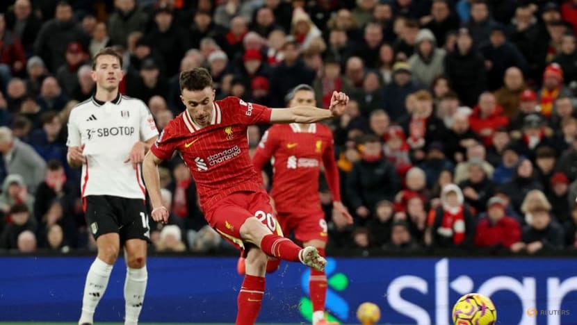 Late Jota goal for 10-man Liverpool salvages draw against Fulham