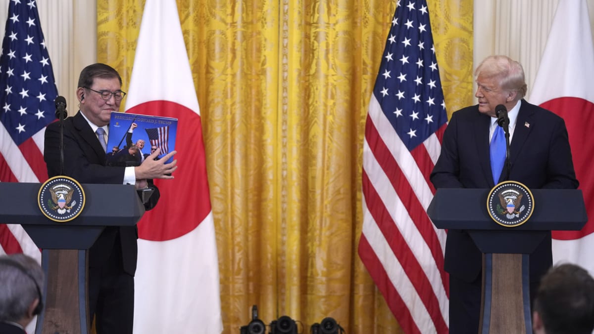 Trump says US and Japan will work to cut trade deficit as he greets Ishiba