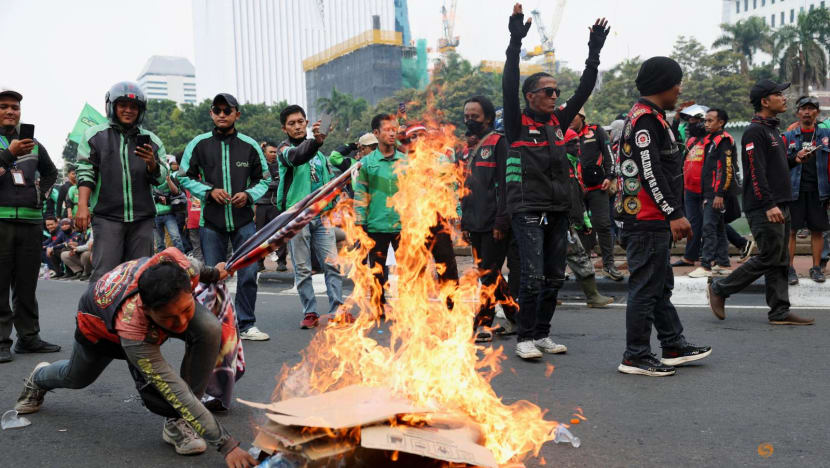 Indonesian app-based motorcycle taxi drivers strike in protest over low pay